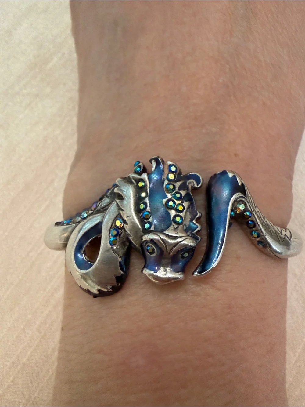 Chico’s water, dragon hinged Bracelet with Blue-Green Accents